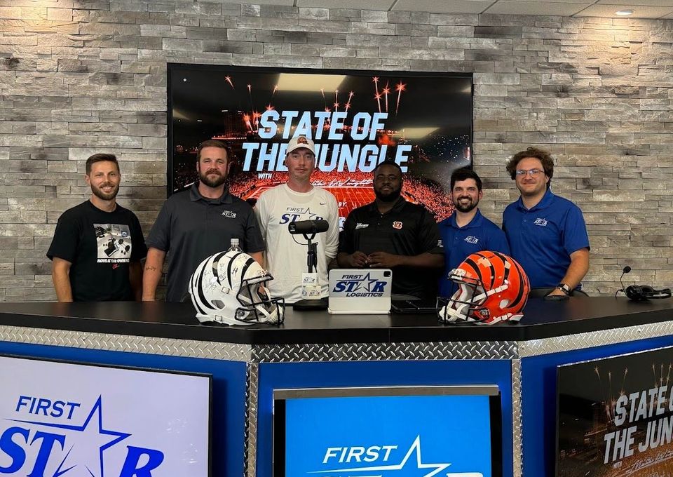 Bengals media personalities gathered on a studio set