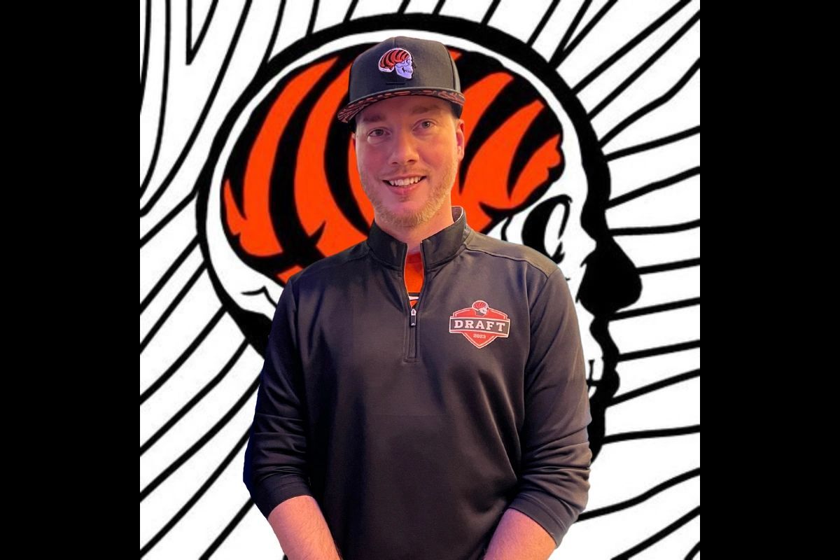 Joe Goodberry in front of the Bengals On The Brain skull logo