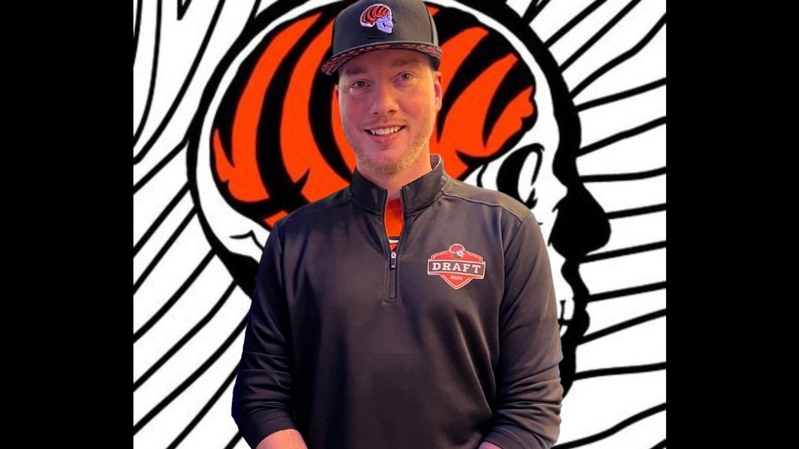 Joe Goodberry in front of the Bengals On The Brain skull logo