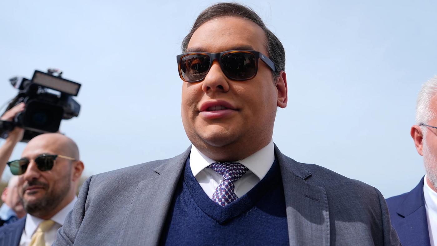 George Santos settles