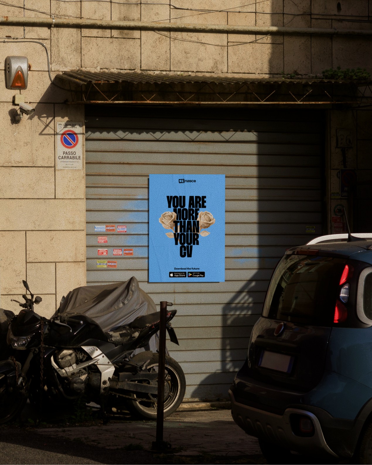 Renasce street poster reading You are more than your CV on a garage shutter