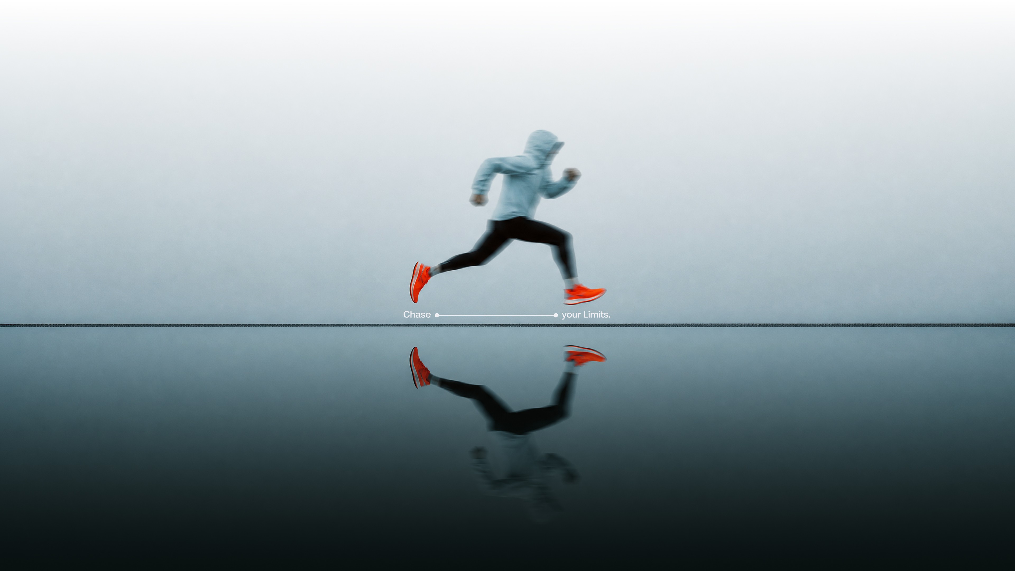 Campaign visual of a runner in a grey hoodie and orange shoes mid-stride above a mirror-like surface, reflected below, with the line Chase your Limits.