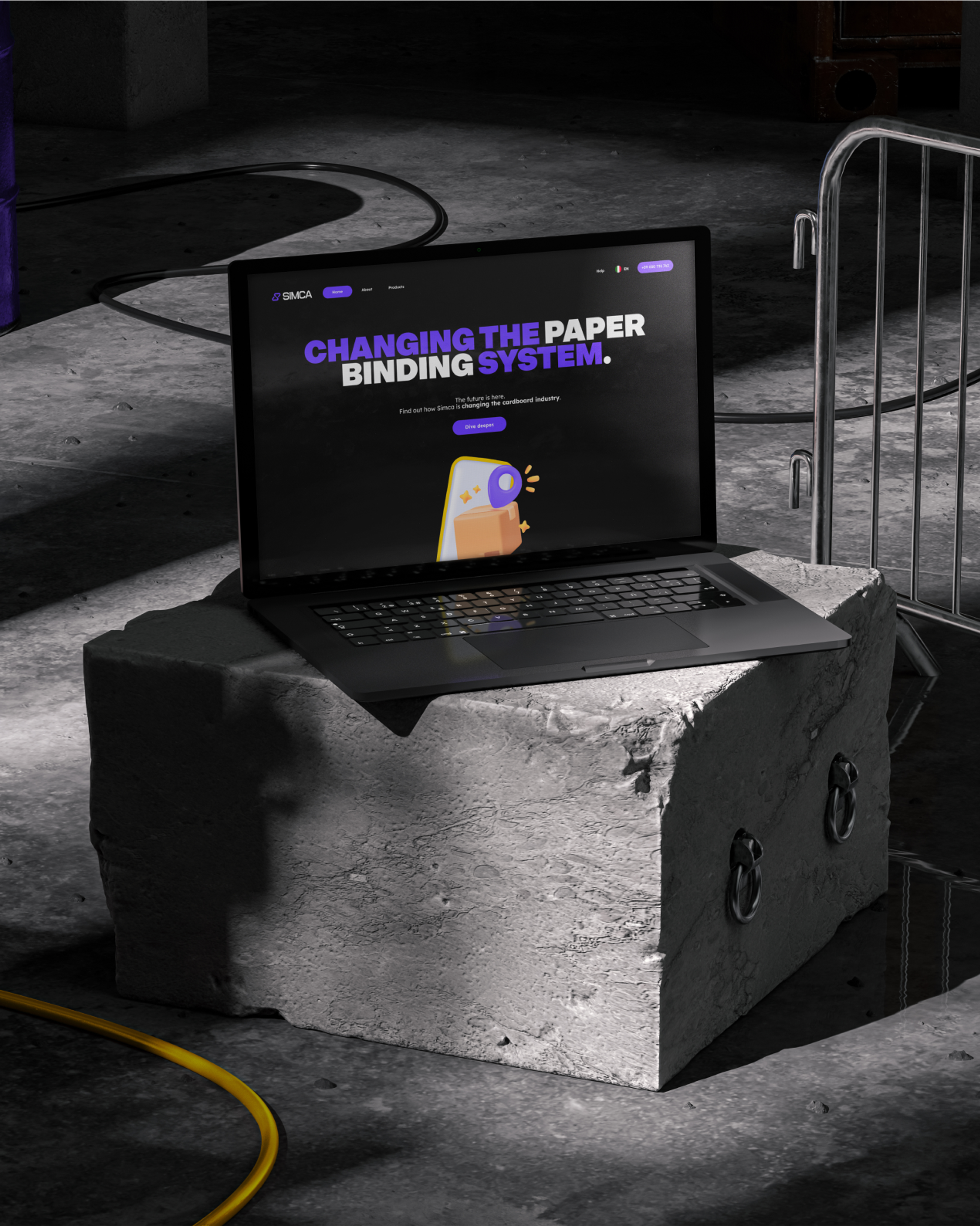 Laptop on a concrete block showing SIMCA website, Changing the paper binding system