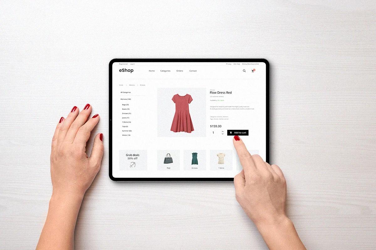 Customer browsing an online store from a tablet to view products and complete online purchases Hiweb.