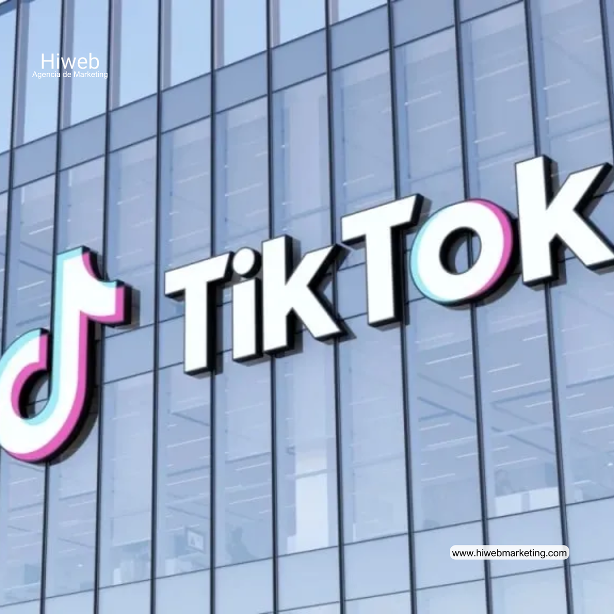 Modern building facade with a large TikTok logo, representing digital platforms and social media within the digital marketing ecosystem, Hiweb.