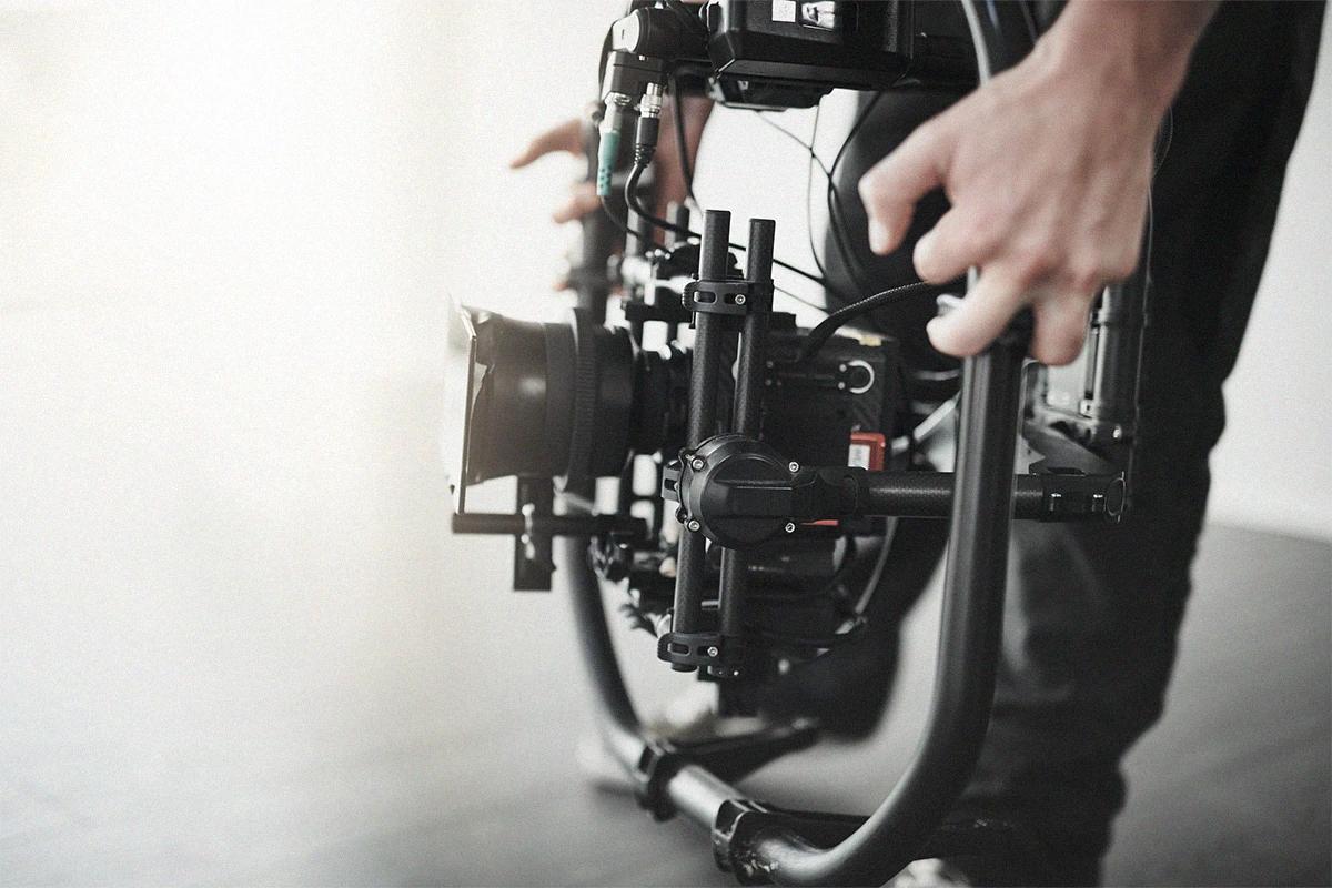 Person operating a professional video camera