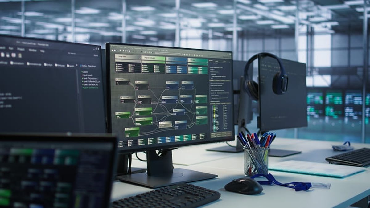Workstation with multiple monitors displaying programming interfaces and specialized software, representing system development and technology management. Hiweb