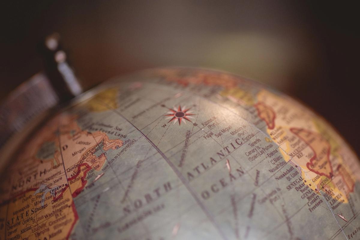 Globe image symbolizing global expansion and brand positioning across different markets. Hiweb Marketing Agency