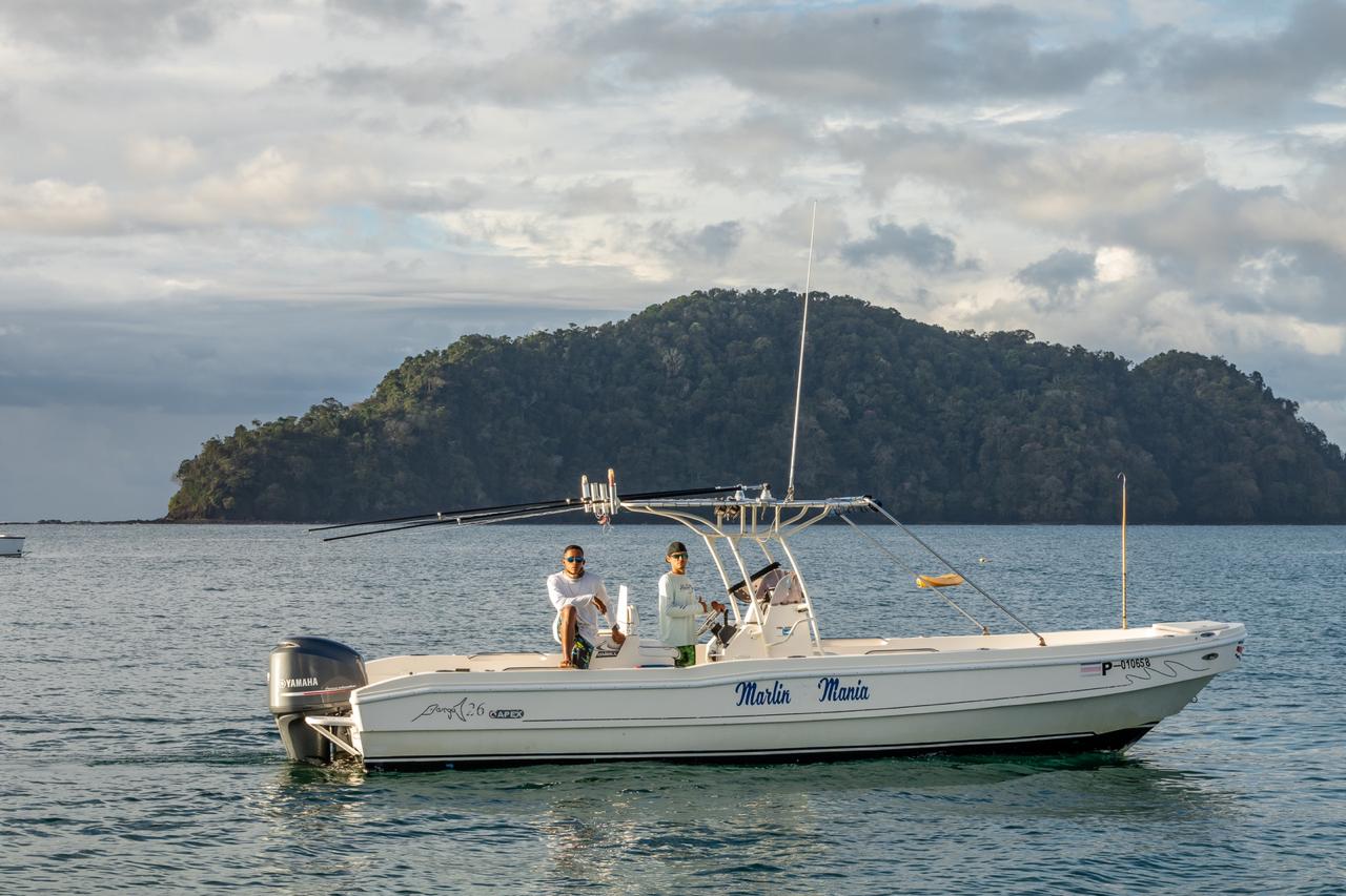 Marlin Mania 28-foot fishing charter boat in Herradura Bay, Costa Rica.