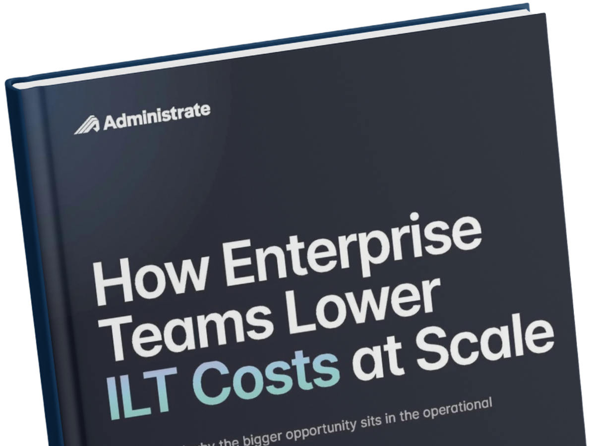 Close-up angled view of the Administrate ebook cover "How Enterprise Teams Lower ILT Costs at Scale" on a black background, showcasing the dark navy book design with white and teal title text.