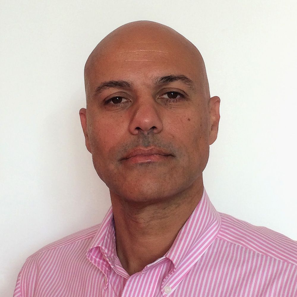 Headshot of Alain Cohen.