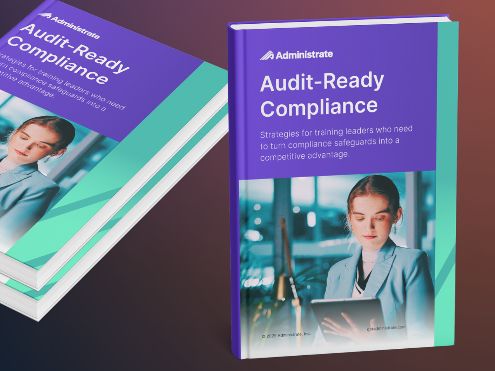 Two copies of the Administrate Audit-Ready Compliance ebook displayed at an angle.