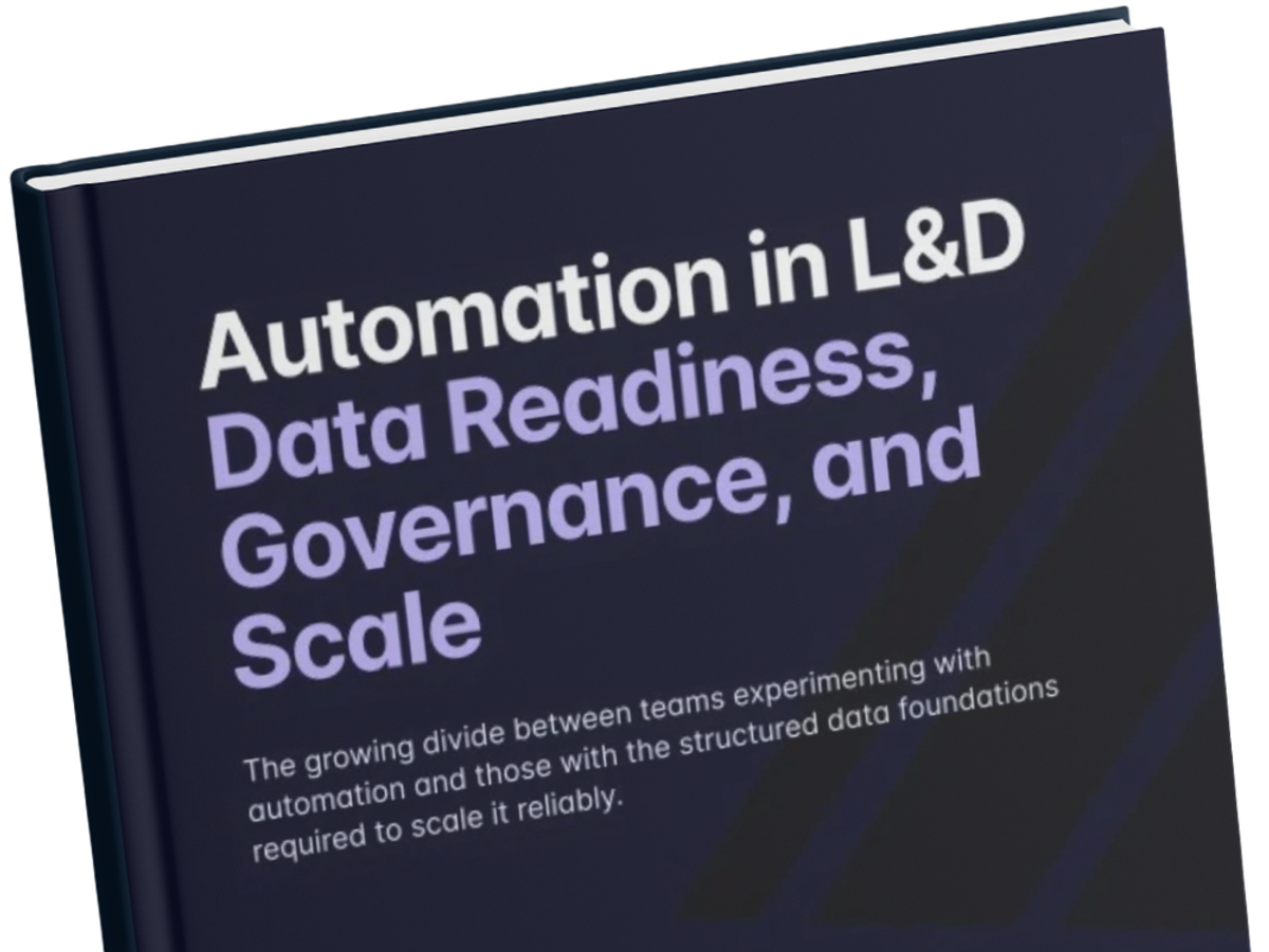 Close-up angled view of Administrate's report cover, "Automation in L&D: Data Readiness, Governance, and Scale." The dramatic perspective emphasizes the bold white and lavender title typography against a dark navy cover.