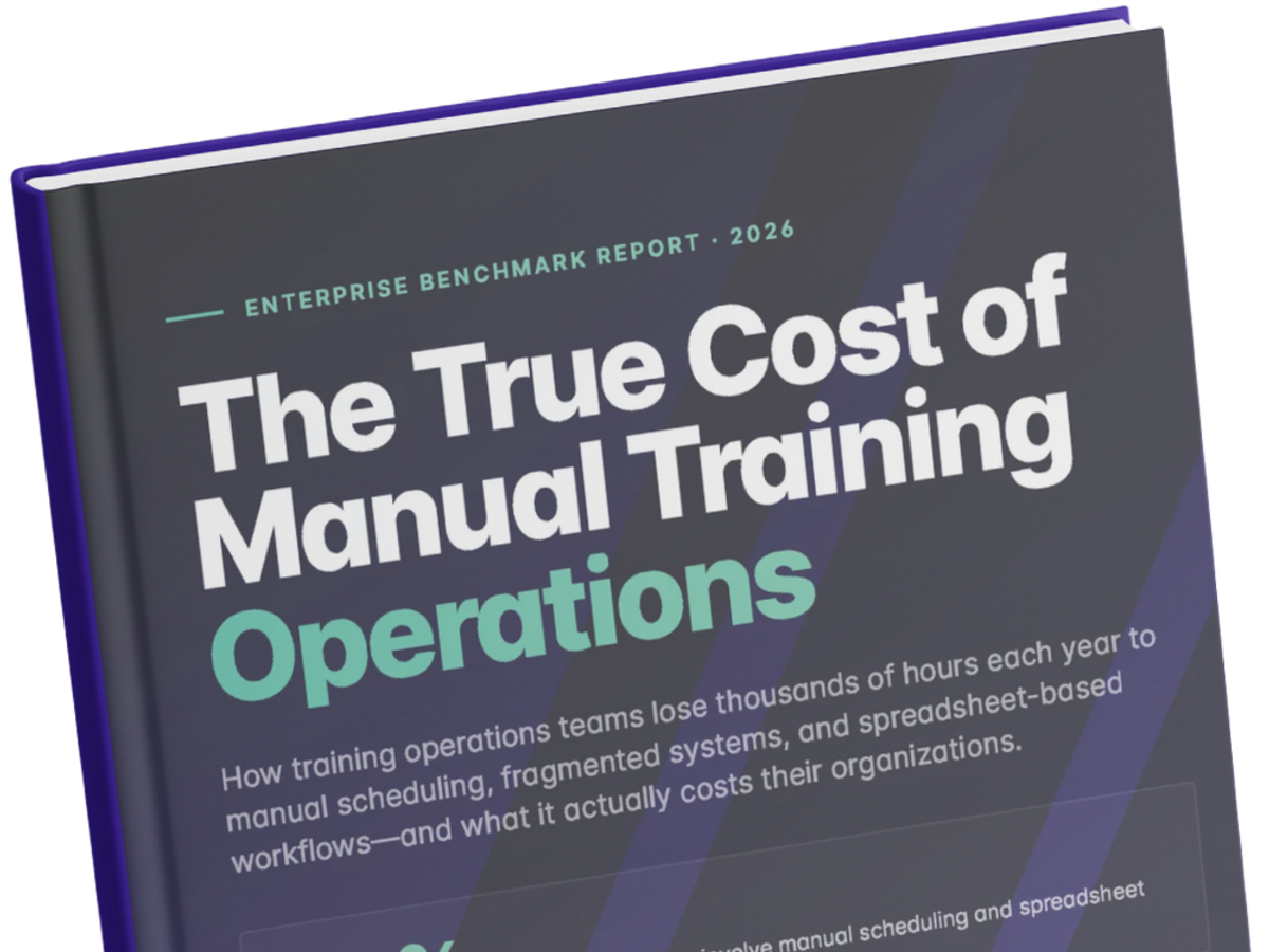 Close-up angled view of the cover of Administrate's 2026 Enterprise Benchmark Report, "The True Cost of Manual Training Operations." The dramatic perspective emphasizes the bold white and teal title typography against a dark navy cover.