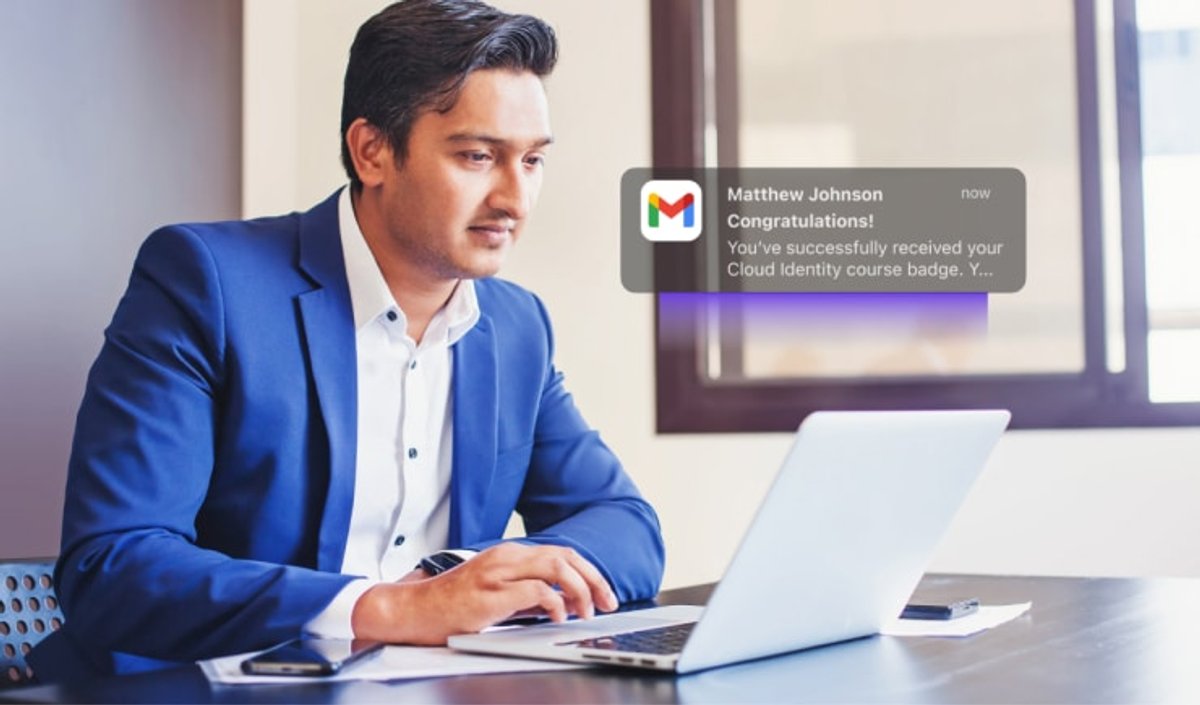 Training professional looks at a digital badge earned from Administrate, delivered to his Gmail inbox.