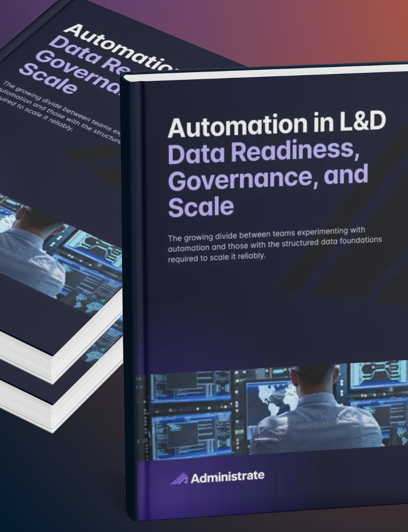 Stacked hardcover book mockup of Administrate's report "Automation in L&D: Data Readiness, Governance, and Scale," shown standing in front of a horizontal stack of additional copies on a purple and orange gradient background. The cover features a photograph of a person viewing multiple data monitors and the Administrate logo at the bottom.