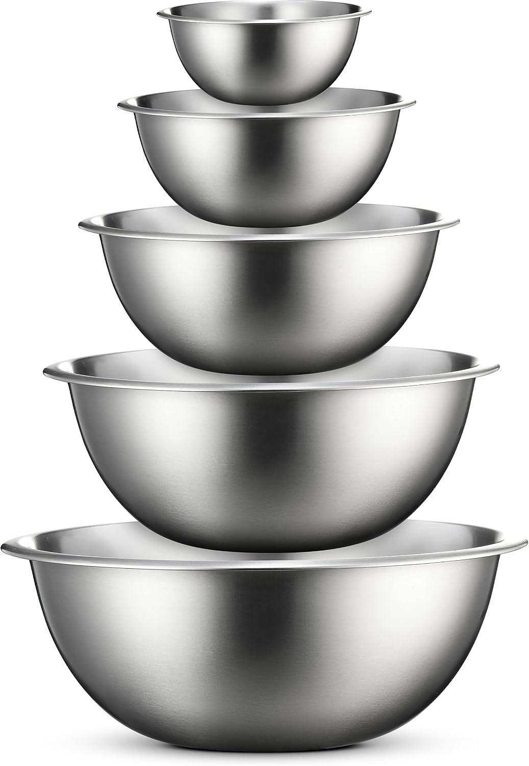Five stainless steel mixing bowls nested in a stack from small to large