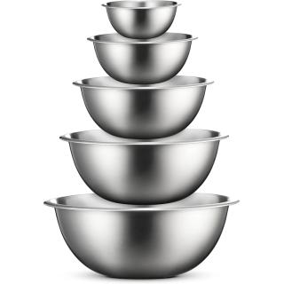 Five stainless steel mixing bowls nested in a stack from small to large