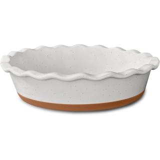 White speckled ceramic pie dish with a fluted rim and a terracotta base