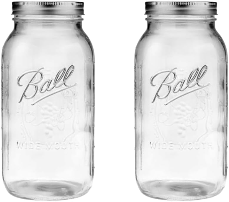 Two wide-mouth half-gallon Ball glass jars with metal screw lids