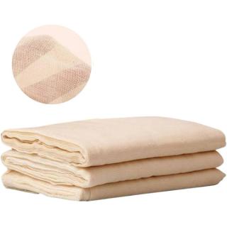 Three folded pieces of unbleached cream cotton cheesecloth stacked, with an inset close-up of the grade 90 weave