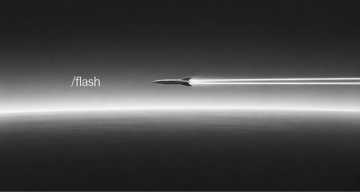 A grayscale image of a sleek rocket flying horizontally, leaving two bright light trails. The word "/flash" is on the left.