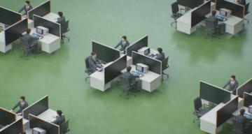 Green-floored office with workers in cubicles with vintage computers, arranged in repeating star patterns.