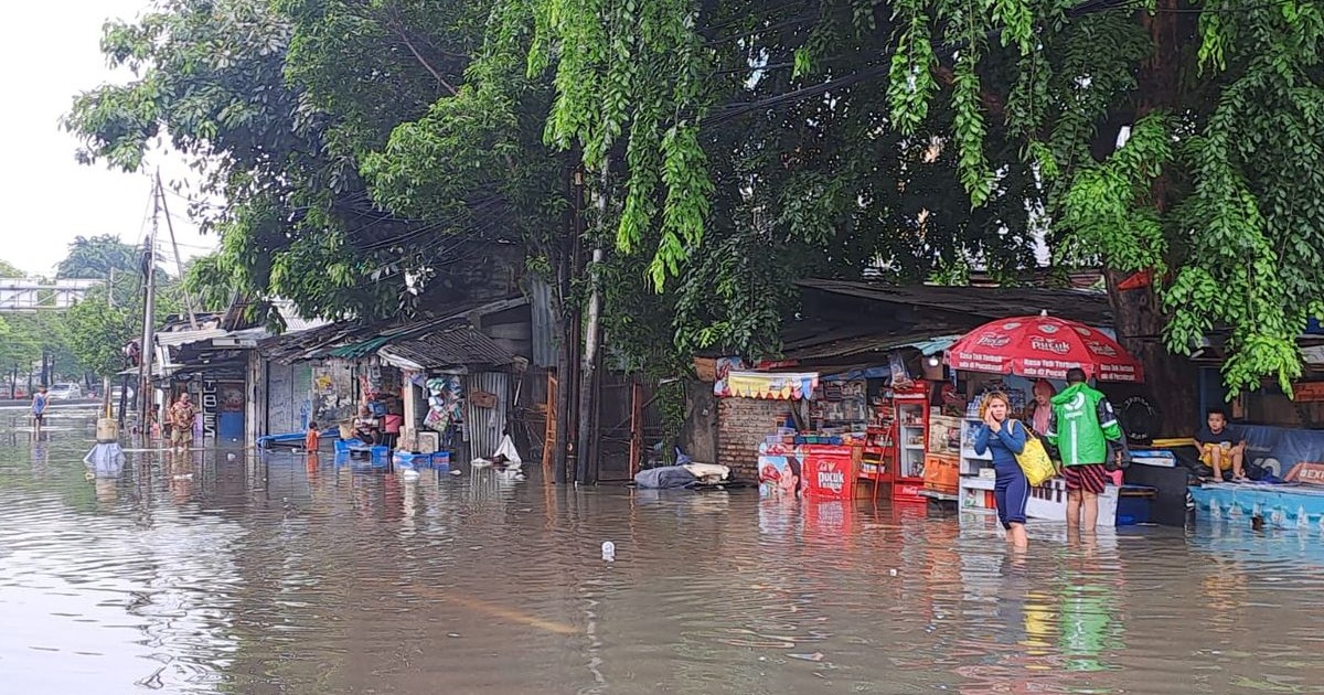 Ilustrasi artikel: Main Air Gratis di Daan Mogot: Banjir 60 cm, Kendaraan Diminta Pindah Haluan!