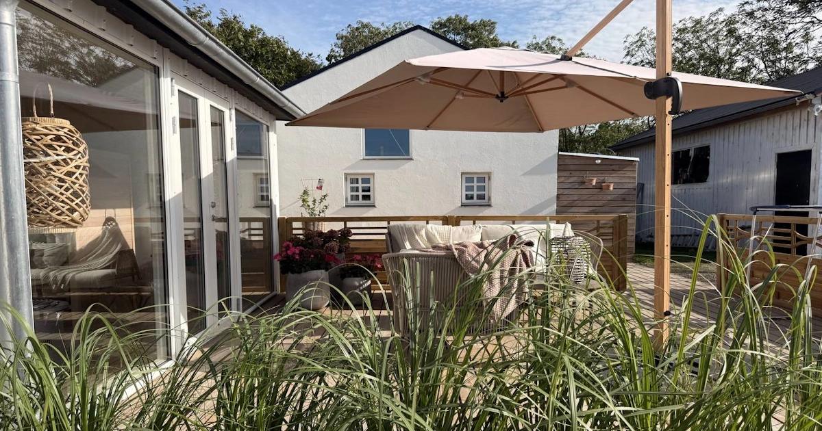 Renovering af træterrasse i trykimprægneret fyr - udskiftning af slidte terrassebrædder og kontrol af underkonstruktion