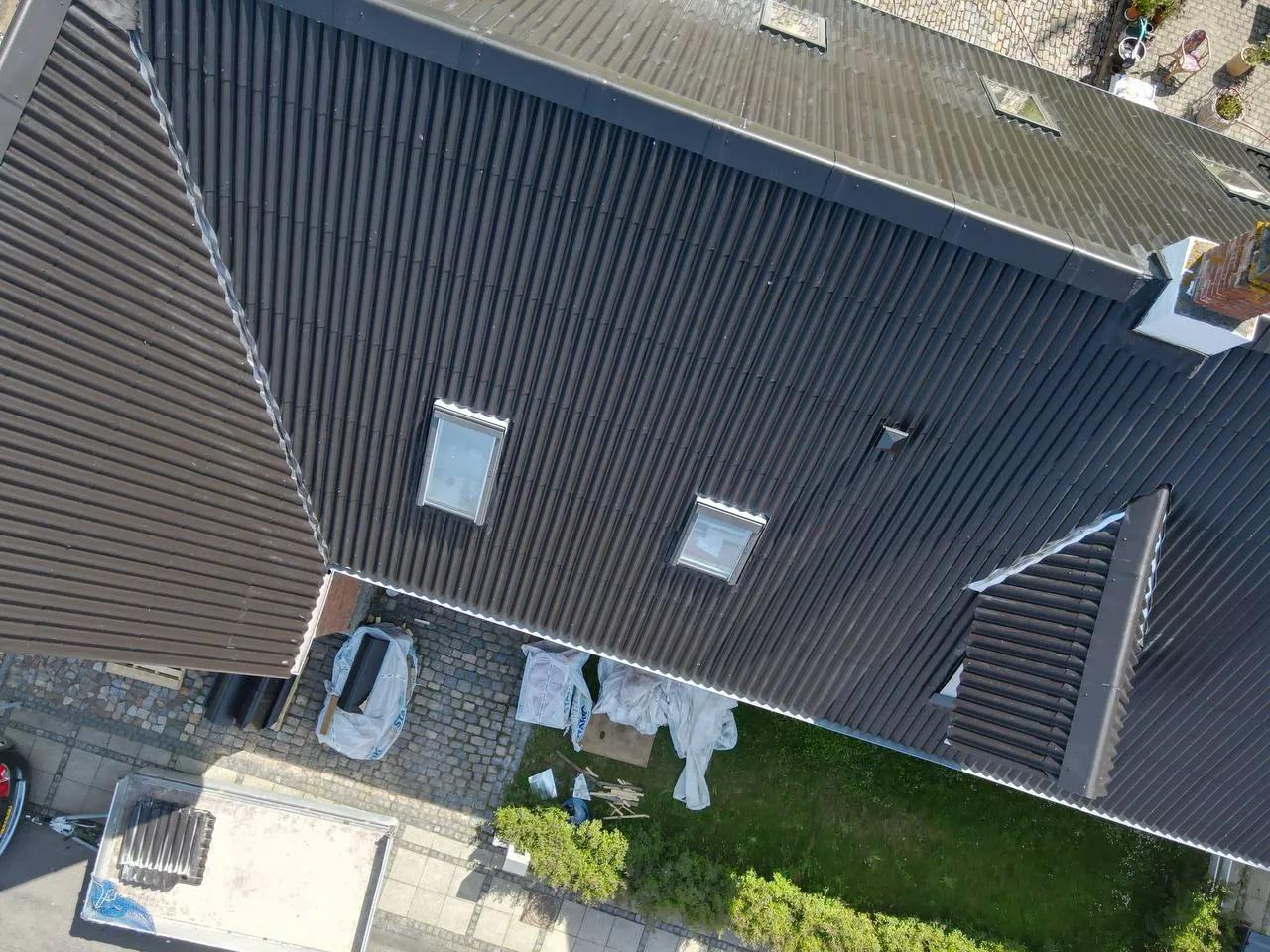 Ståltag på bolig med tagvinduer