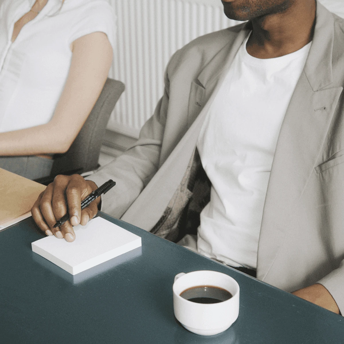 Legal professional reviewing documents at a desk