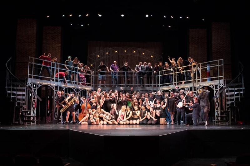 Ram’s Head Chicago full company photo on the Memorial Auditorium stage