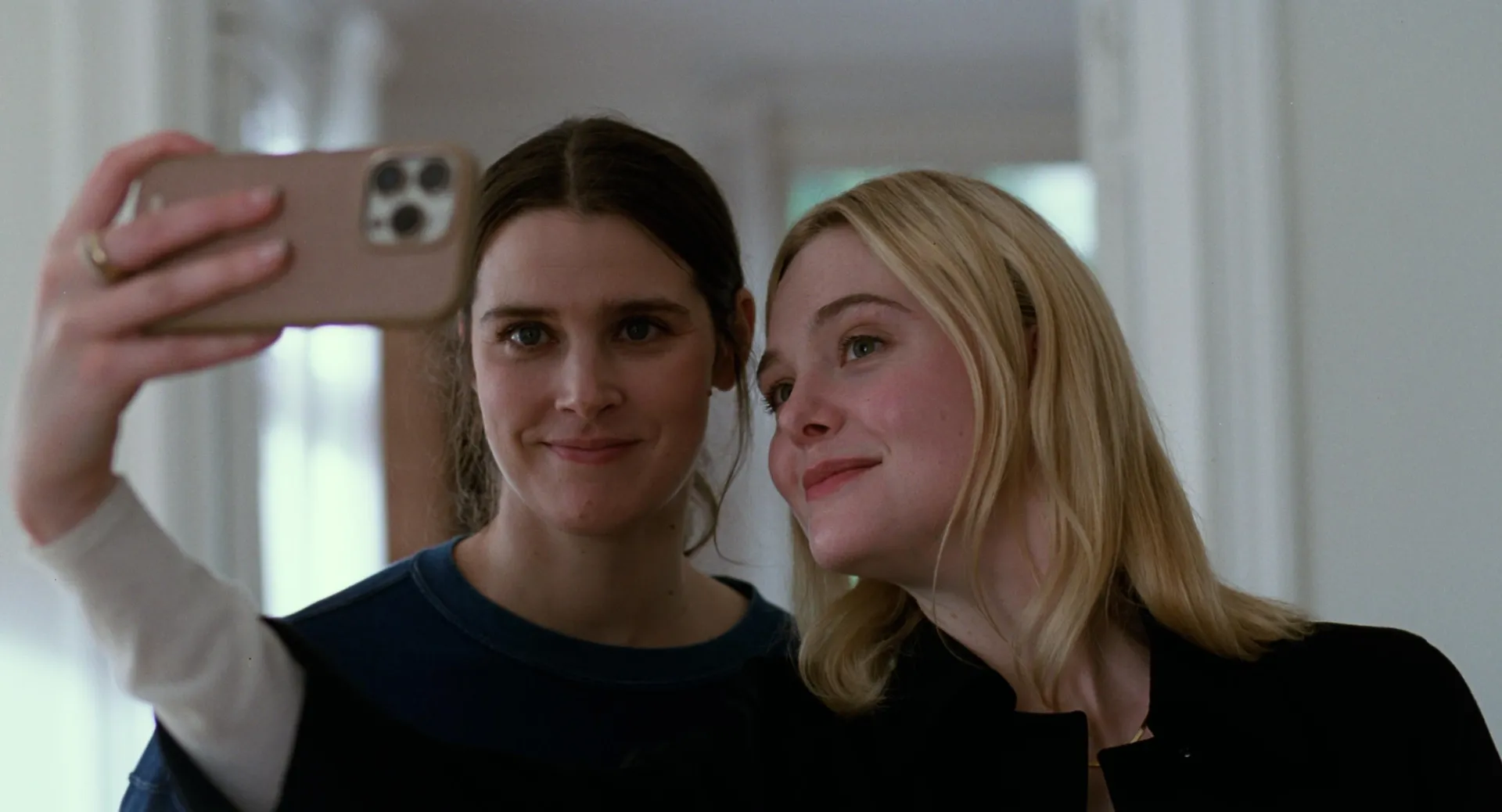 Actors Inga Ibsdotter Lilleaas and Elle Fanning in a scene from Sentimental Value, filmed partly on location in Oslo and in studio at Gateway Studios. Photo by Kasper Tuxen.