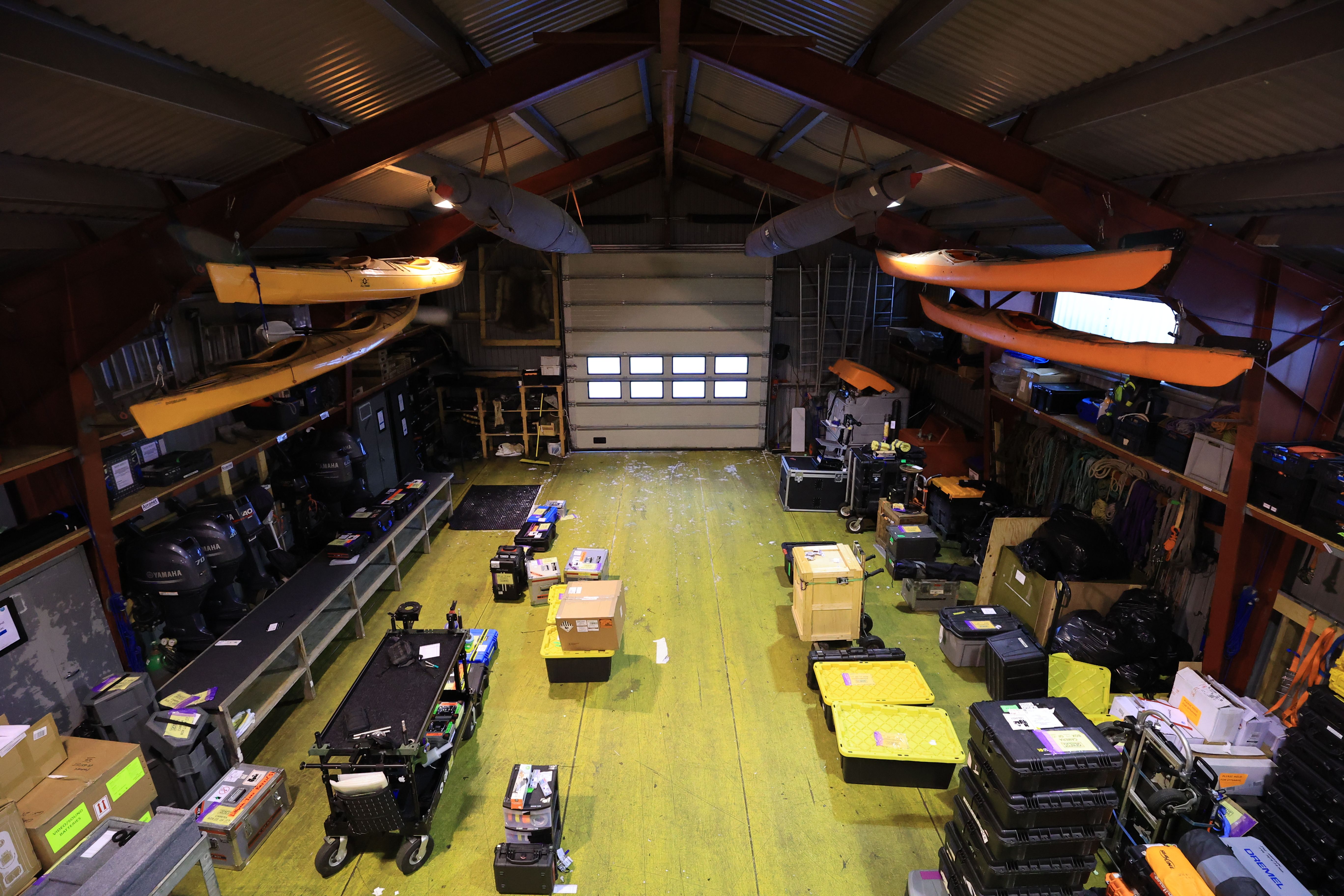 Overhead view of PolarX’s Svalbard equipment depot, where specialized Arctic film gear is staged for deployment. Designed to support diverse shoots — from wildlife documentaries to sci-fi blockbusters — the facility ensures seamless operations across polar landscapes.