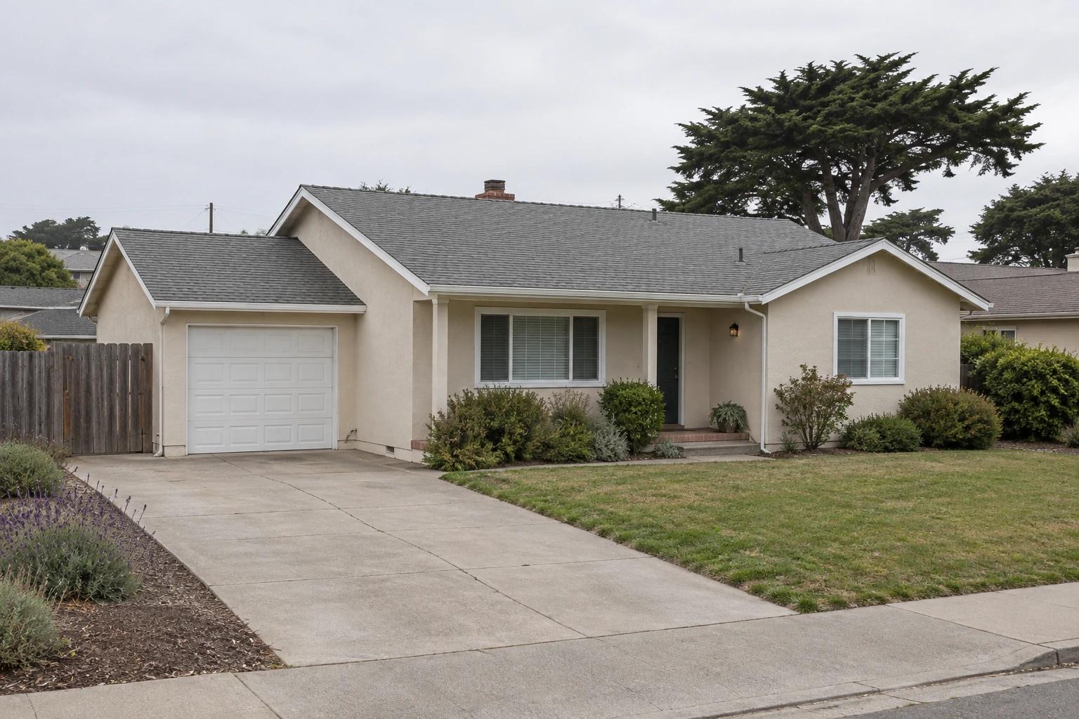 Modest Central Coast style home with a residential shingle roof