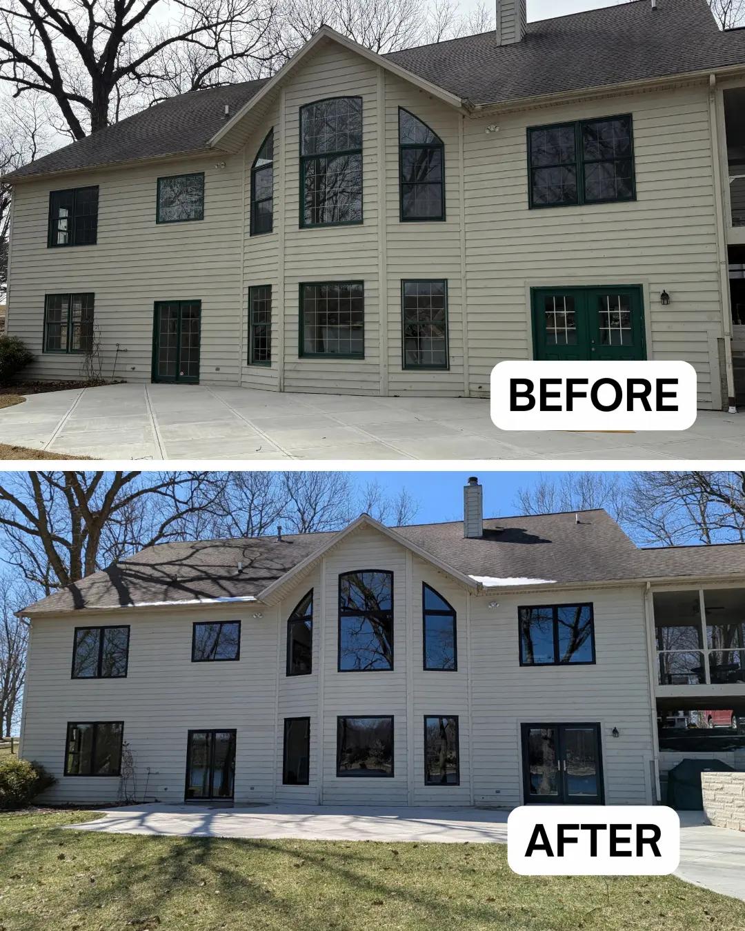 Before and after full window and patio door replacement on a two-story home. Green framed windows and doors replaced throughout with black framed windows and a sliding patio door.