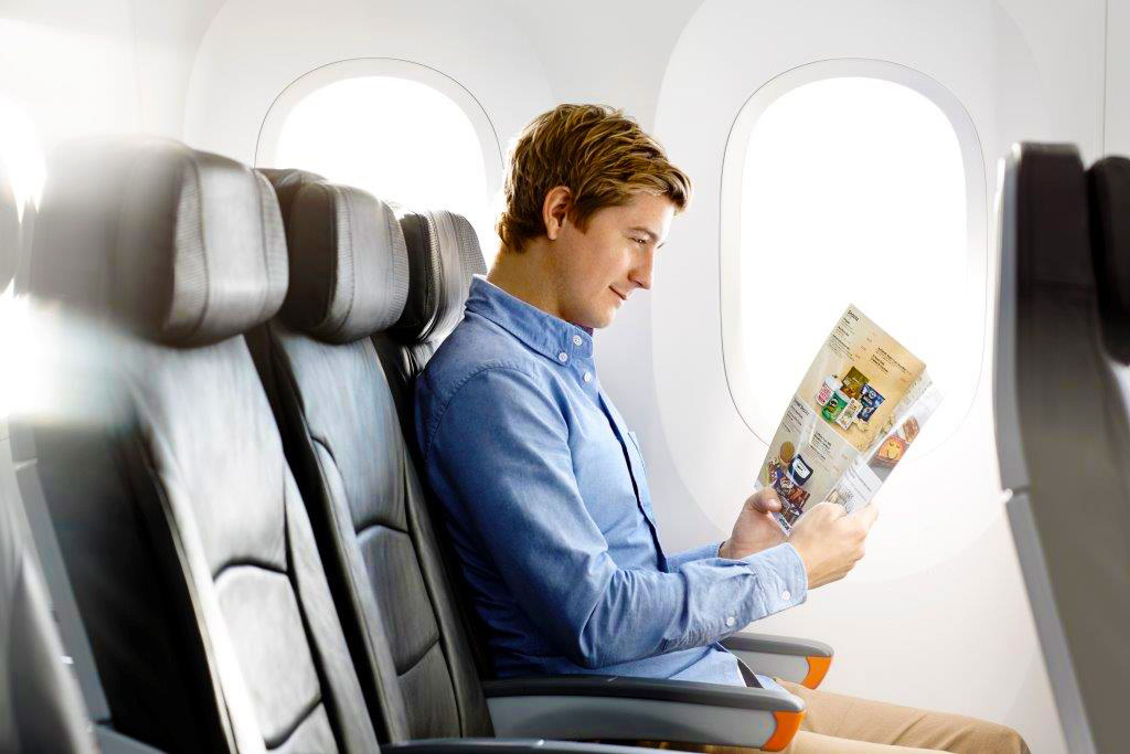 Passenger in airplane seat