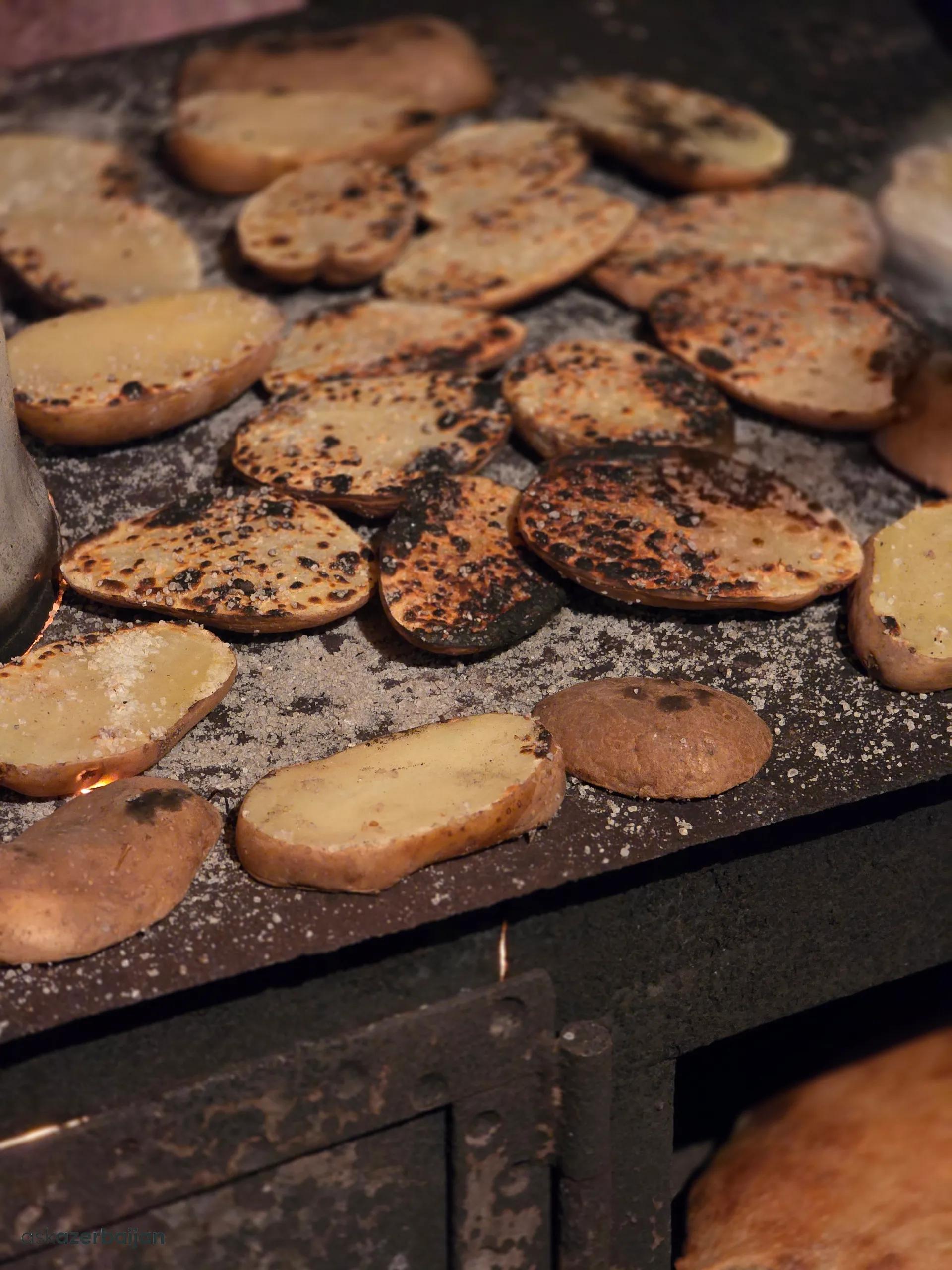 Potatoes cooked on a traditional stove