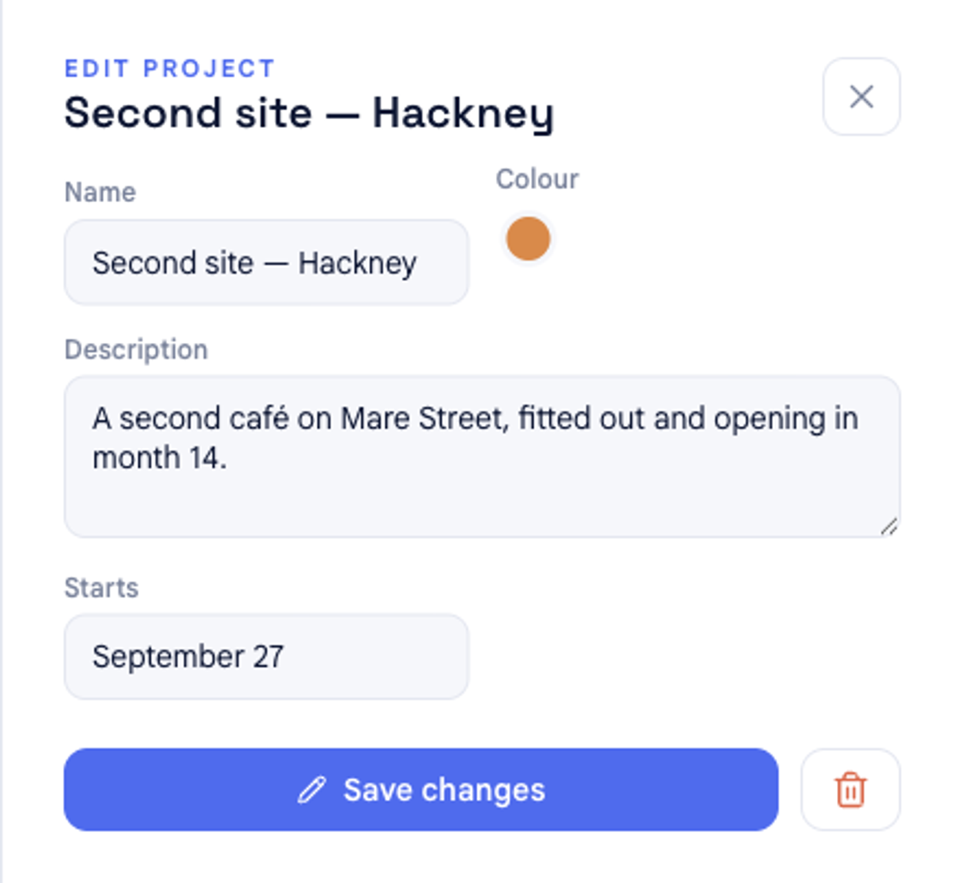 The project panel reopened in EDIT PROJECT mode in bluprnts, with the name, colour and description filled in, a Save changes button, and a delete (trash) button beside it.