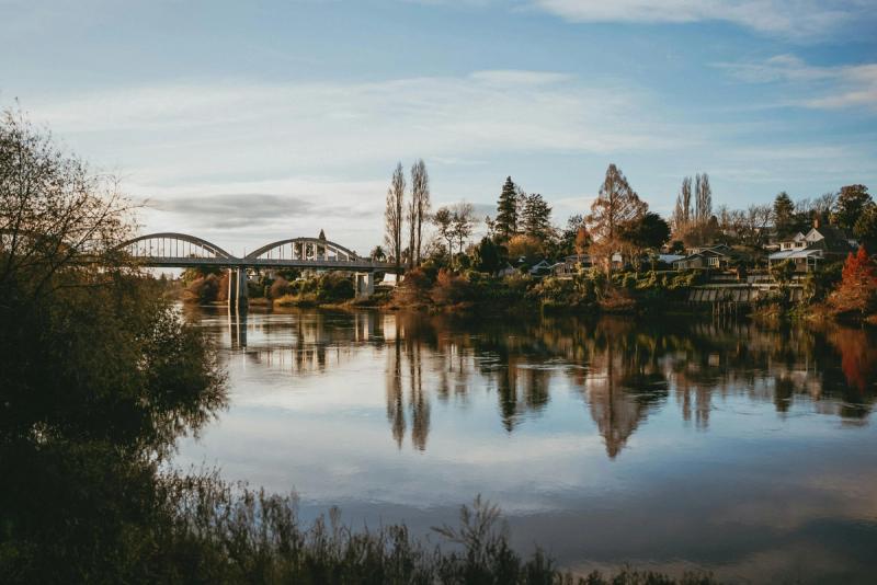 The Waikato River and Fairfield Bridge in Hamilton, served by our residential quantity surveyors.