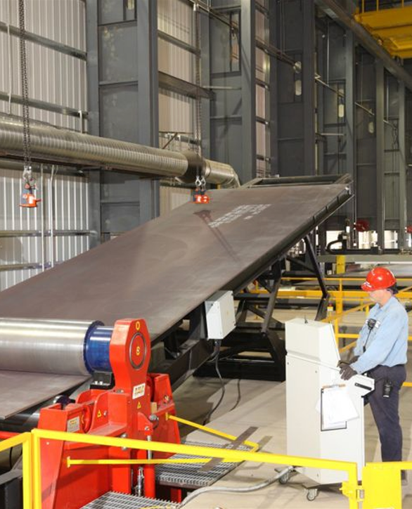 a facility processing steel plate for industrial use, likely for storage tanks. 