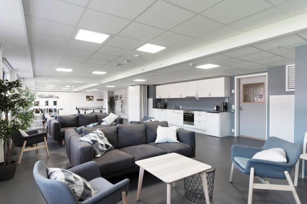 Shared living room and kitchen in student housing.