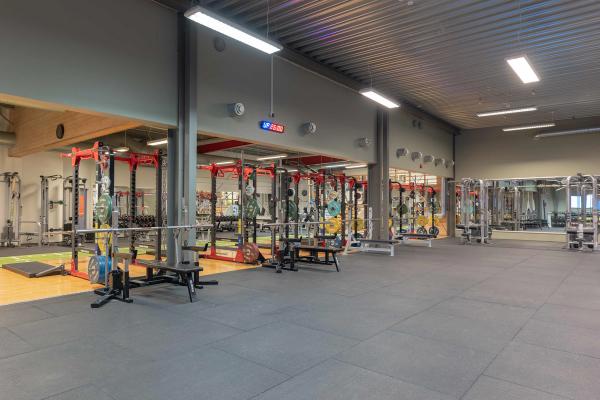 A glimpse of our sports center at Fantoft. It features a fully-equipped gym with weights, dumbbells, and a variety of exercise equipment.
