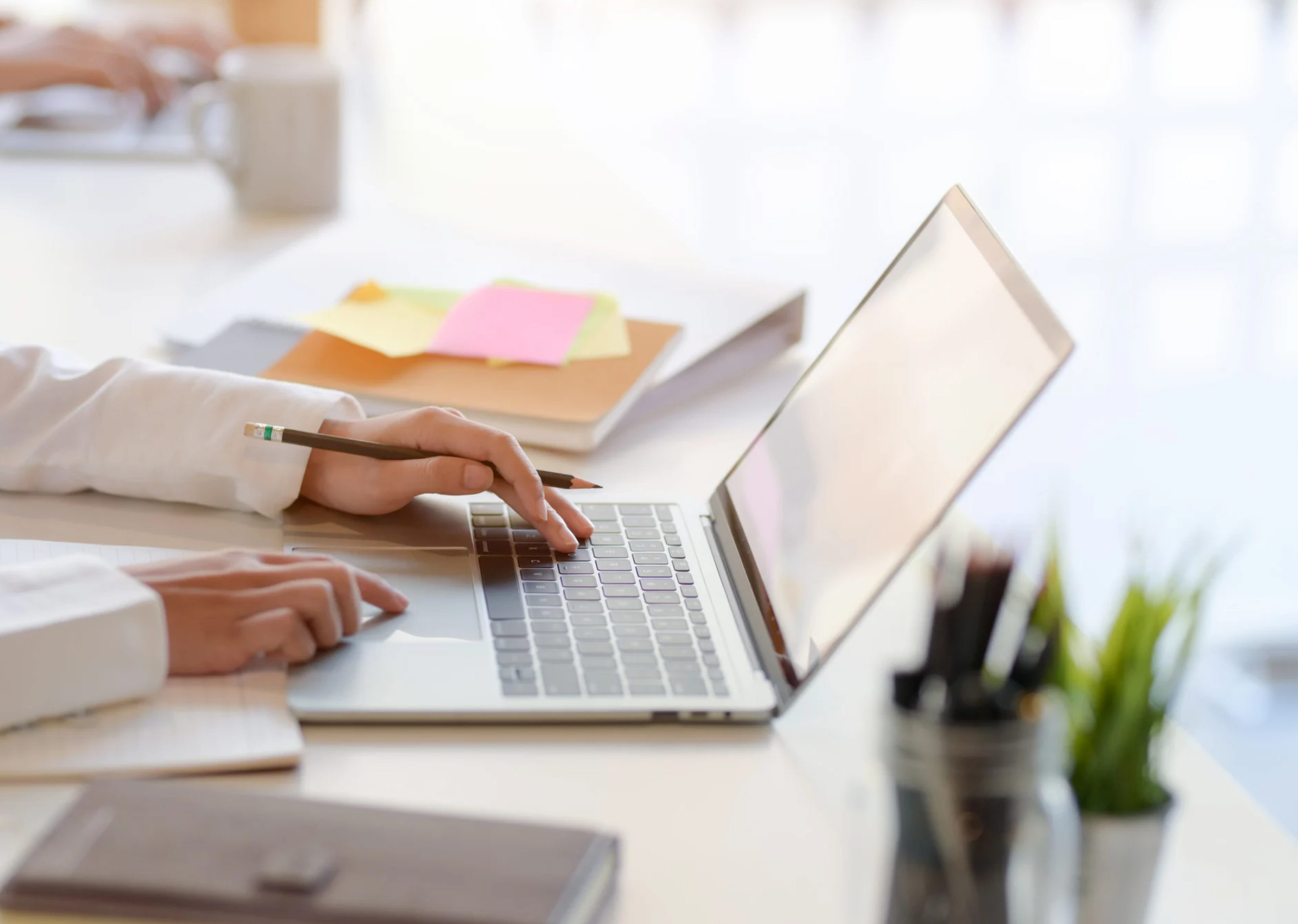 Small business team using a digital platform to view processes, systems and real-time data.