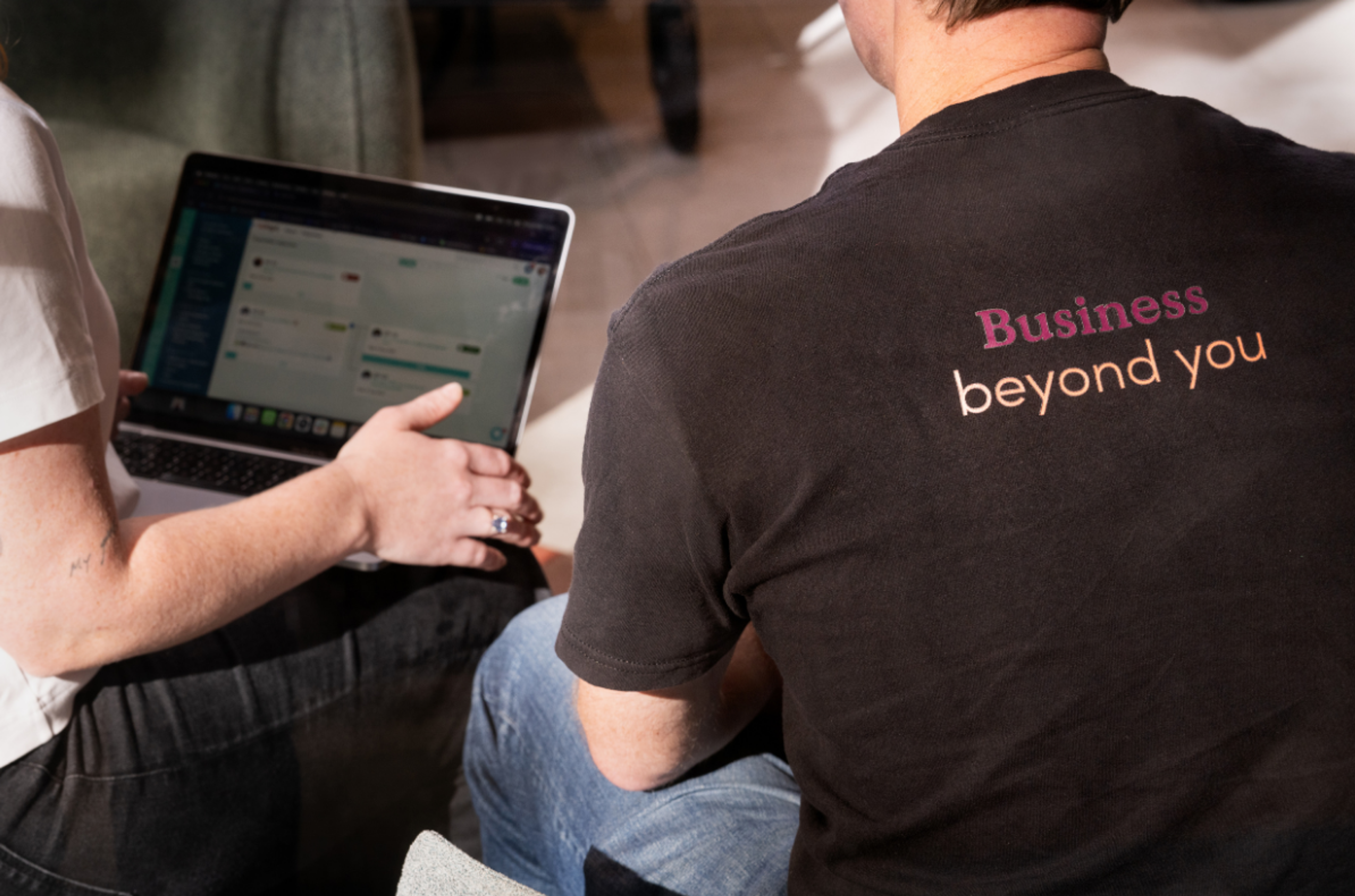 The adapt digital platform being used by an employee during a meeting with the team about upcoming tasks and deadlines