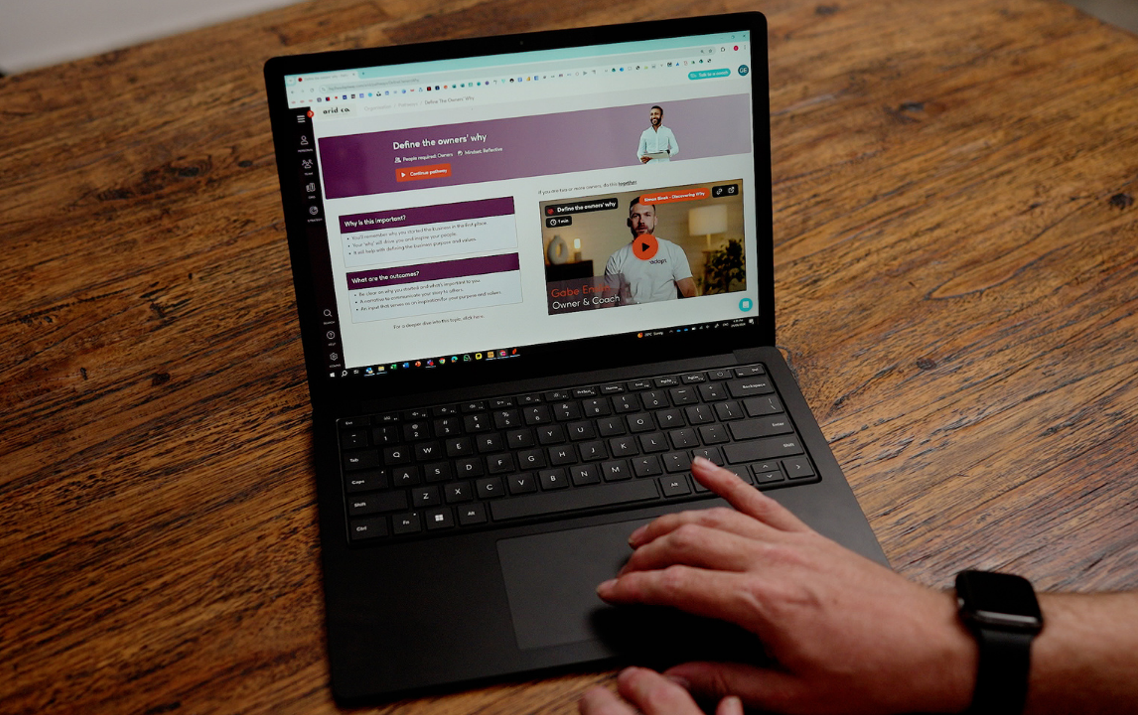 Laptop and phone view of adapt HQ, our business solutions platform.