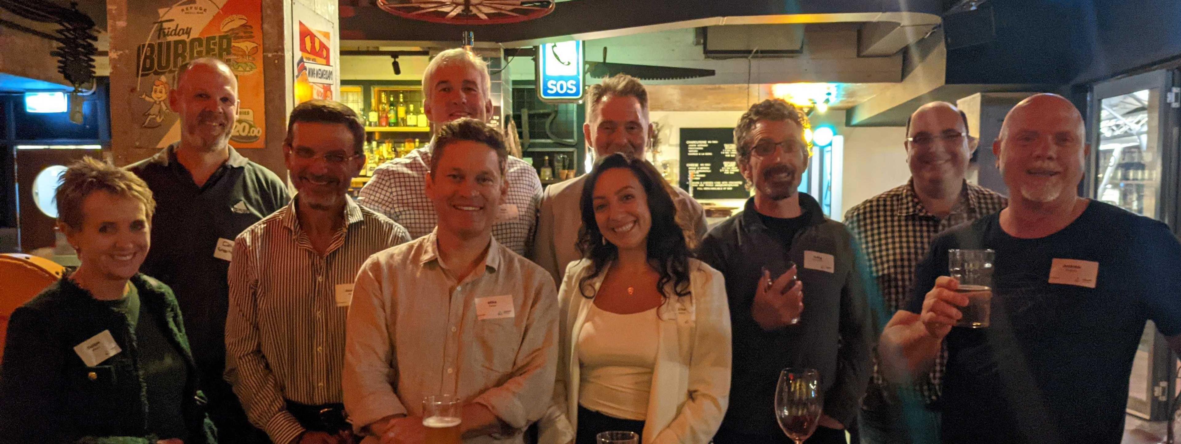 Group photo of Adapt team members at a social event, illustrating the camaraderie and team spirit fostered by Adapt