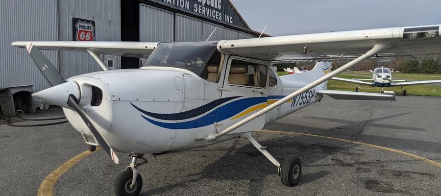 A Cessna 172 awaits refueling at Lee Field (KANP)