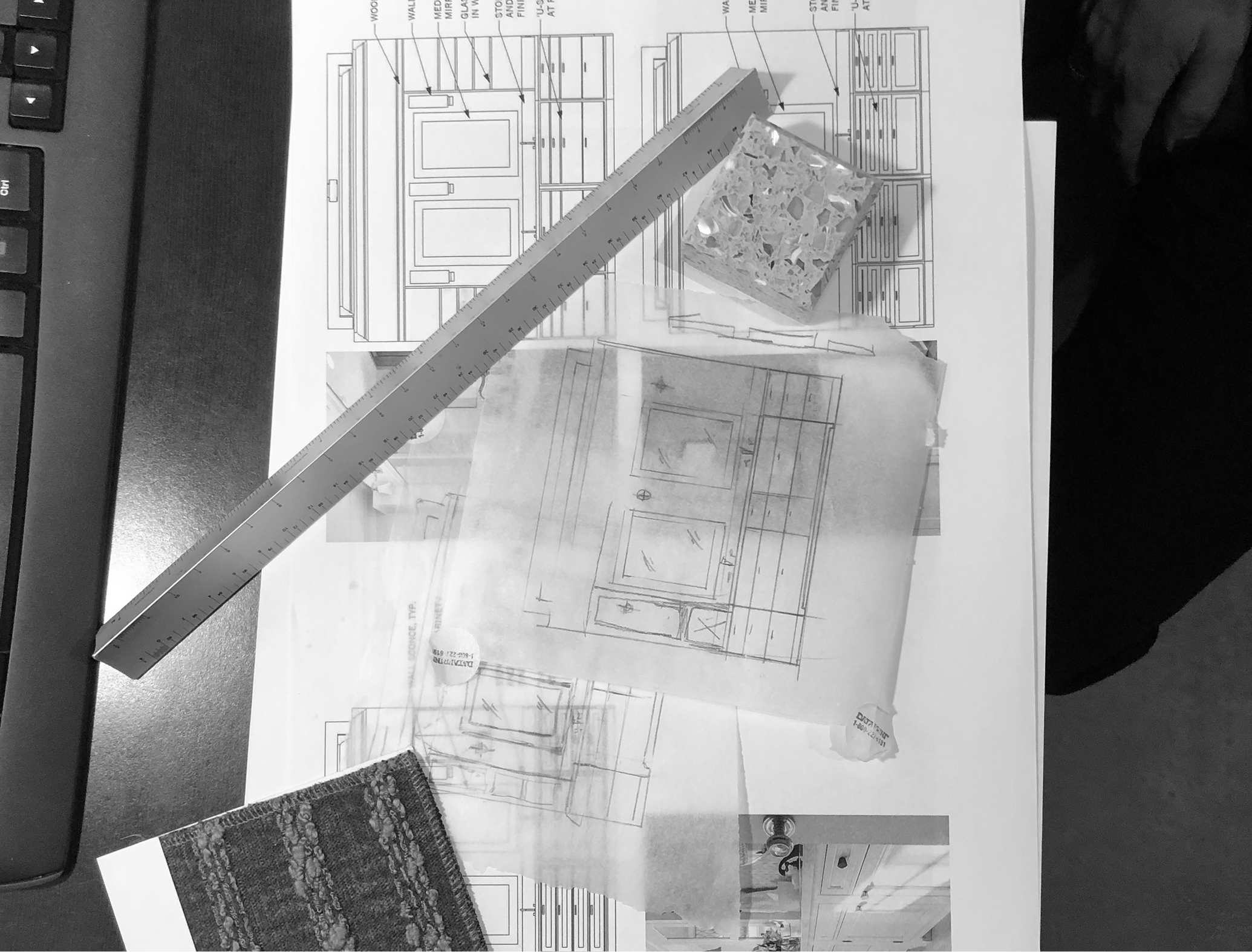 A photo of a person pointing at a diagram