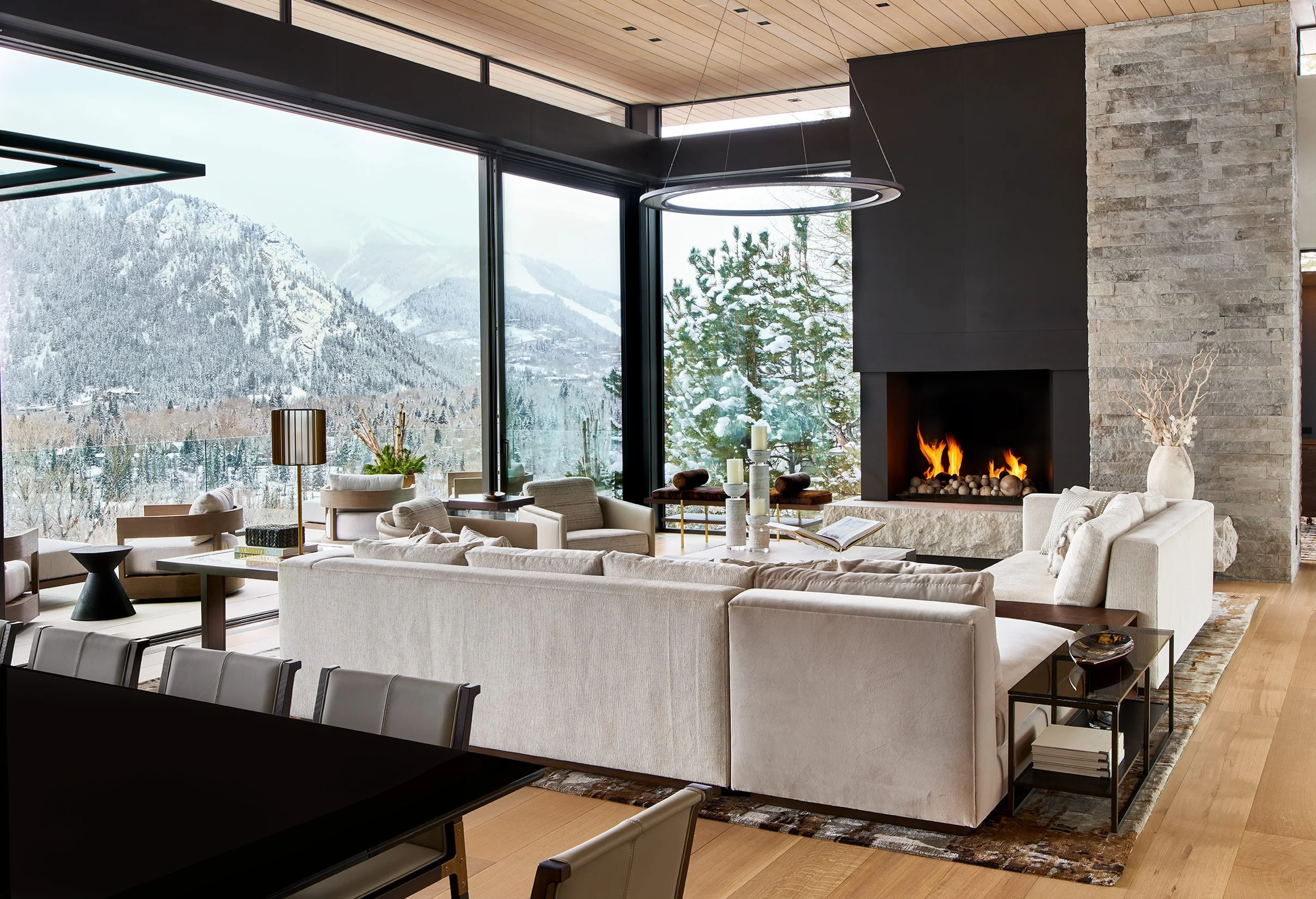 living room in modern mountain view home with big windows